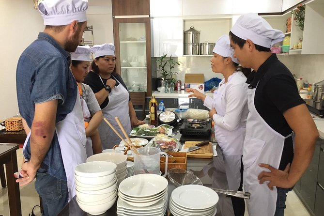 Happy Cooking Class in Danang - Mixing beef mango or papaya salad