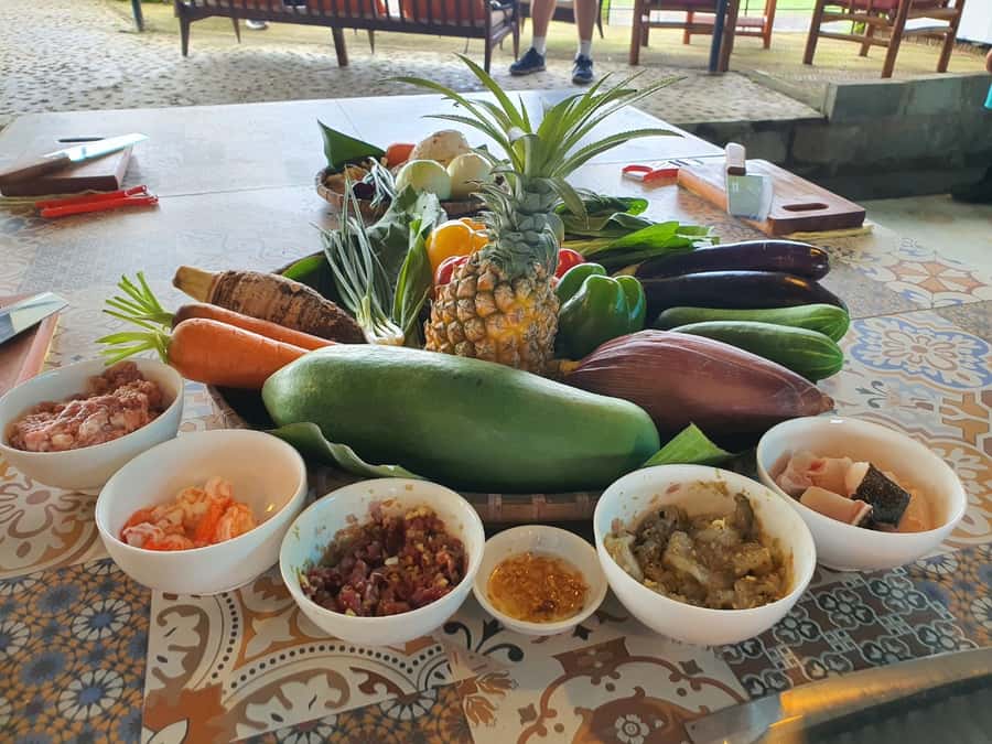 Hoi An Cooking Class With Market and Bamboo Basket Boat Tour - Bay Mau Coconut Village by round bamboo boat