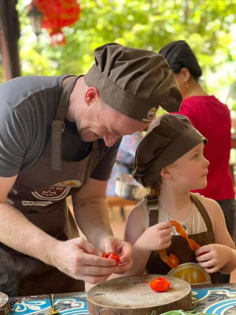 Hue City: Cyclo, Market Tour & Cooking Class at Madam Thu - The herbal foot bath before the kitchen