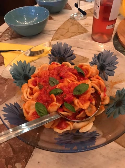 Lecce Home Cooking Class: Craft Orecchiette & Savor Wine - Sitting down to the meal you made