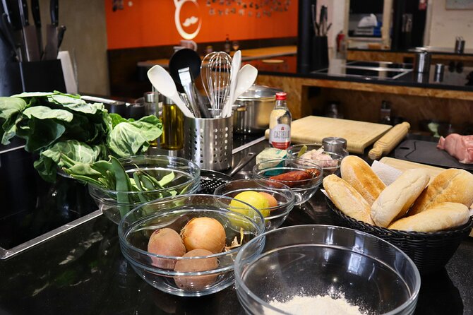Lisbon: Portuguese street food cooking class with Drinks - Arriving at Compadre Cooking School