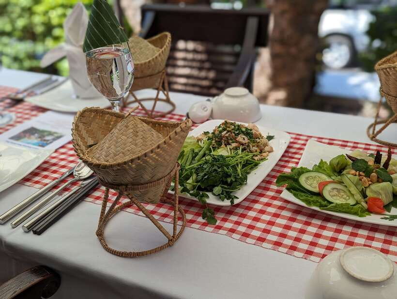 Luang Prabang: Cooking Class at the Former Royal Palace - A market morning beside Wat Xiengthong
