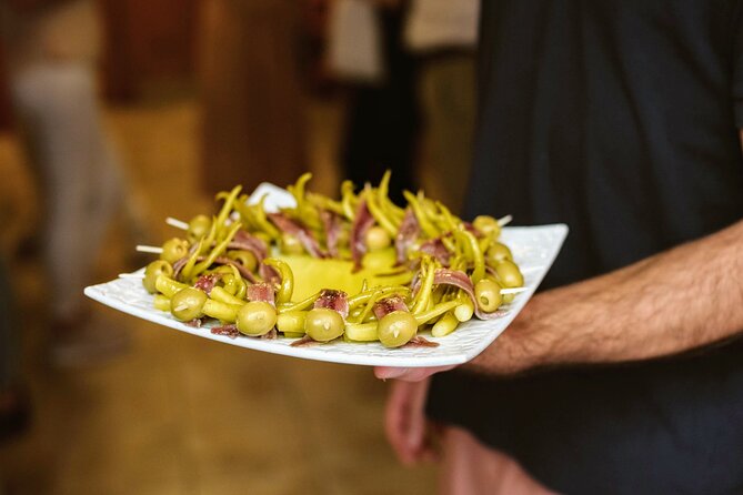 Madrid Tapas & Paella Cooking Experience with Local Market Visit - Dietary needs, age limits, and timing