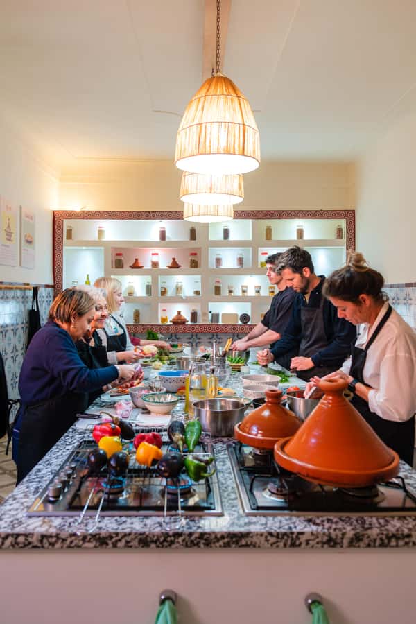 Marrakech: Moroccan Cooking Class with Market Visit and Meal - Entering a bright kitchen in the Medina