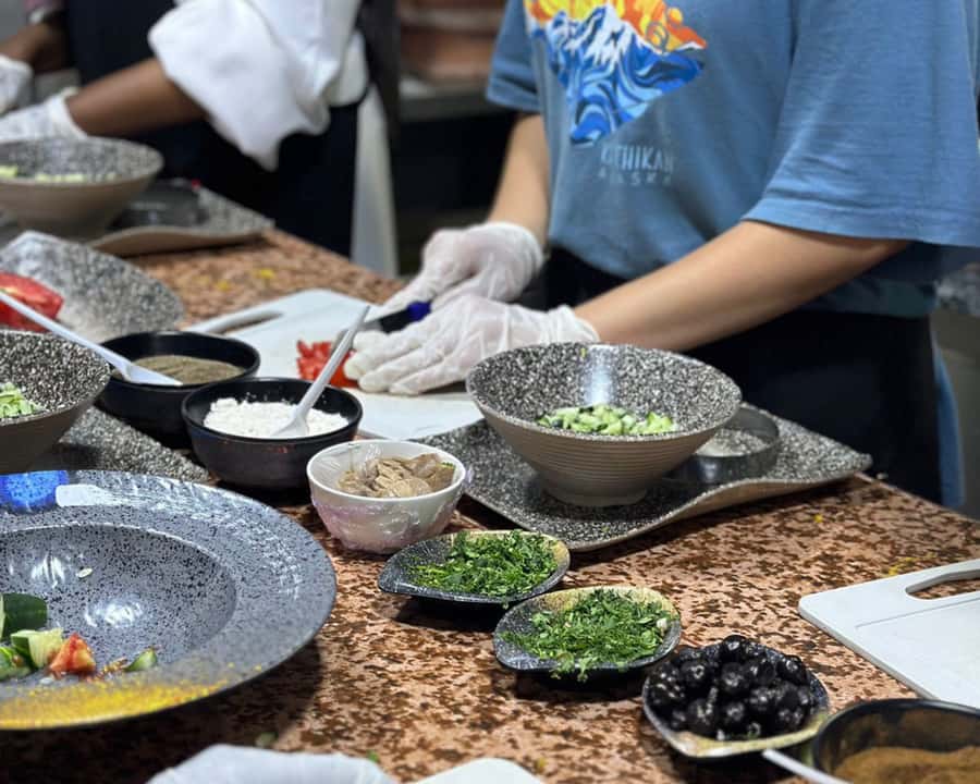 Marrakech: Moroccan Cooking Class with Pickup - Preparing Moroccan salad and tajine