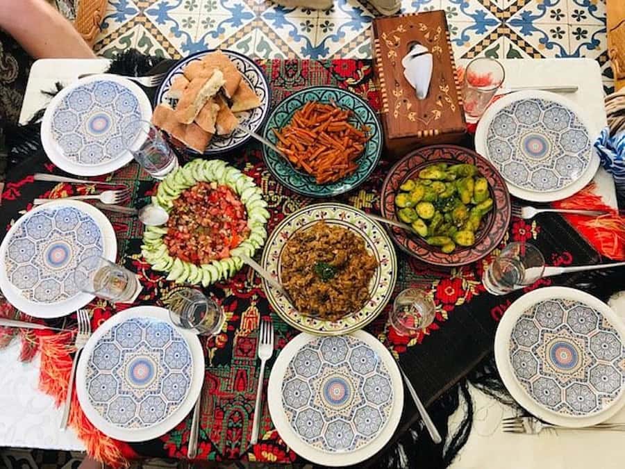 Marrakech: Traditional Moroccan Cooking Class & Market Visit - Eating the meal you prepared