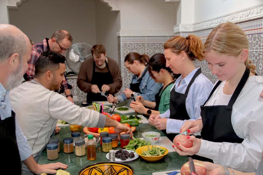 Marrakesh: Moroccan Dishes Cooking Class with a Local Chef - Cooking several tagines as one team