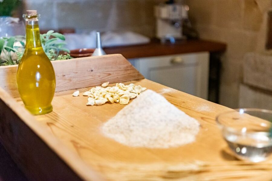 Matera: Pasta Cooking Class Old Farmer Style in Sassi Cellar - Touring a former wine cellar and family home
