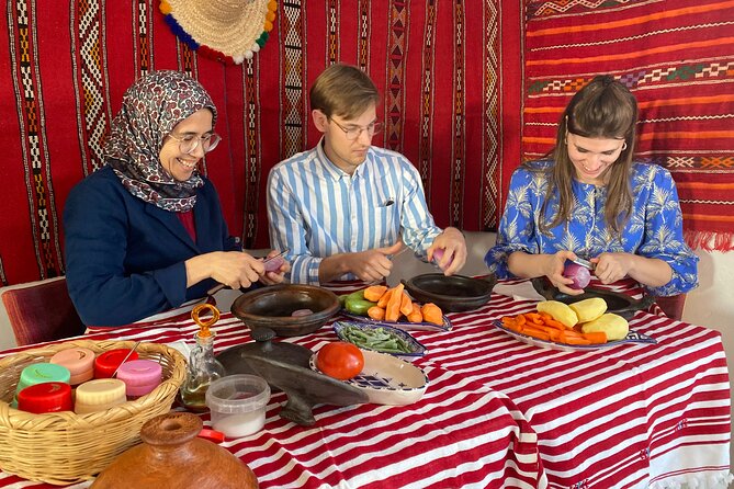Moroccan Cooking Class with a Local Family & Market Visit - Preparing couscous, tajine, and zaalouk