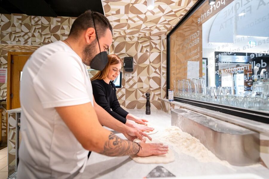 Naples: Authentic Neapolitan Pizza Making Class - Eating the pizza with a starter and soft drink