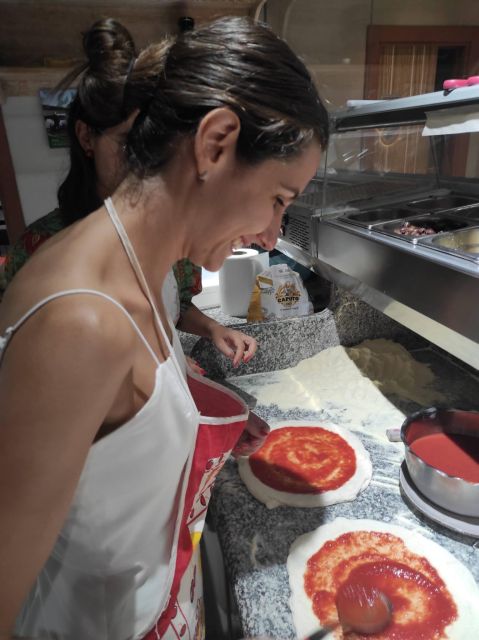 Naples: Small Group Pizza Making with Drink Included - Choosing toppings and balancing the flavors