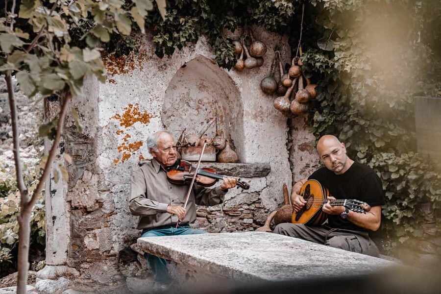 Naxos: Family Farm-table Cooking, Kouros Tour & Live Music - Lunch, local wine, and Naxian music