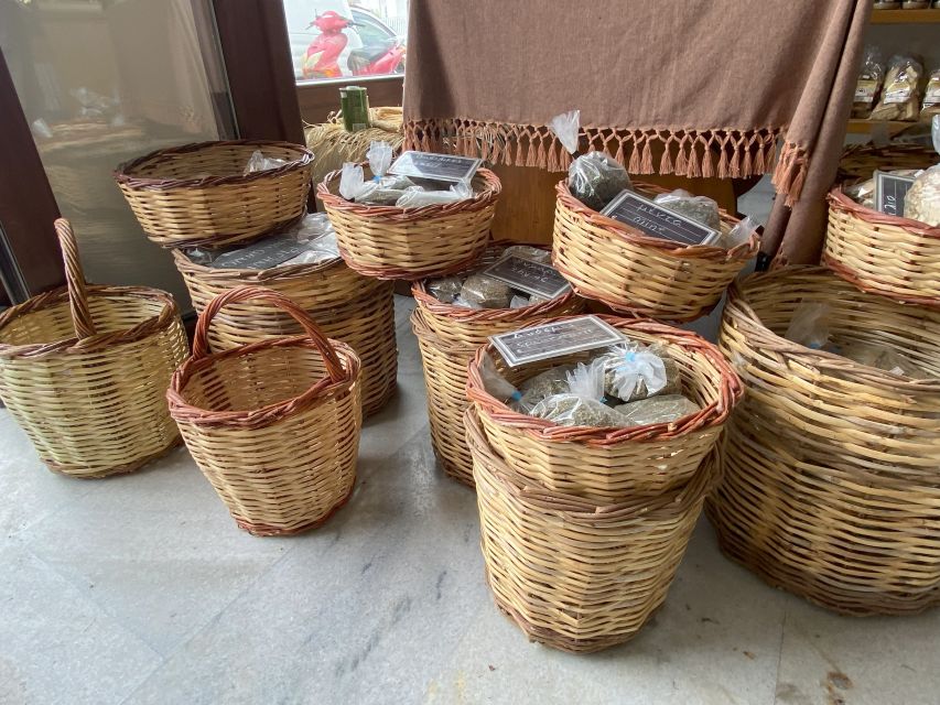 Naxos: Food Walking Tour & Cooking Class with Meal & Drinks - Sitting down to eat what you made