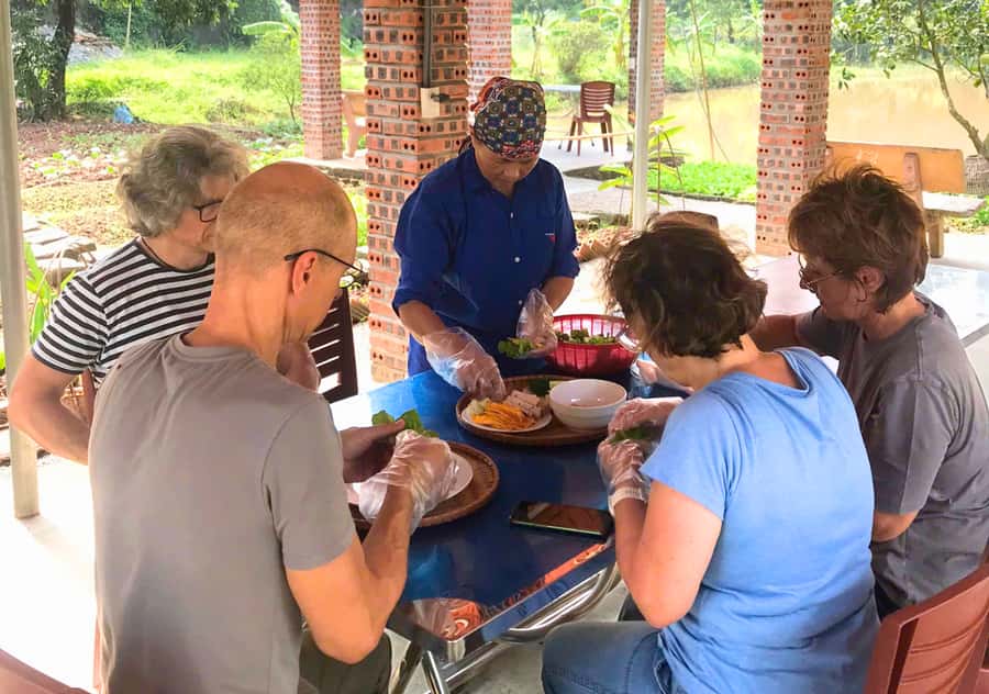Ninh Binh: Half-Day Cooking Class at a Local Home - Catching crabs from a small boat