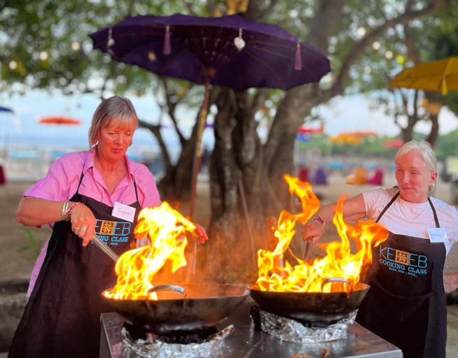 Nusa Dua: Balinese Cooking Class with Market Tour - Preparing the spice pastes that drive the menu