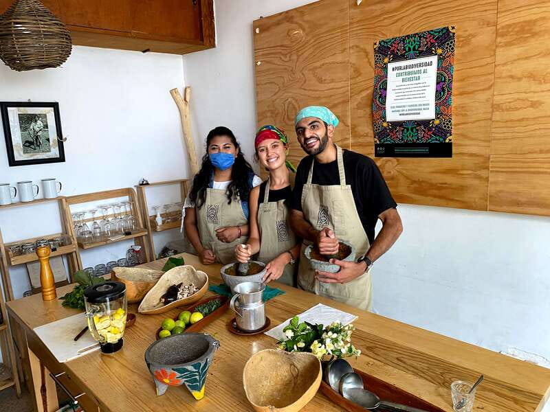 Oaxaca: Vegetarian Cooking Class - Returning to the kitchen for a traditional meal