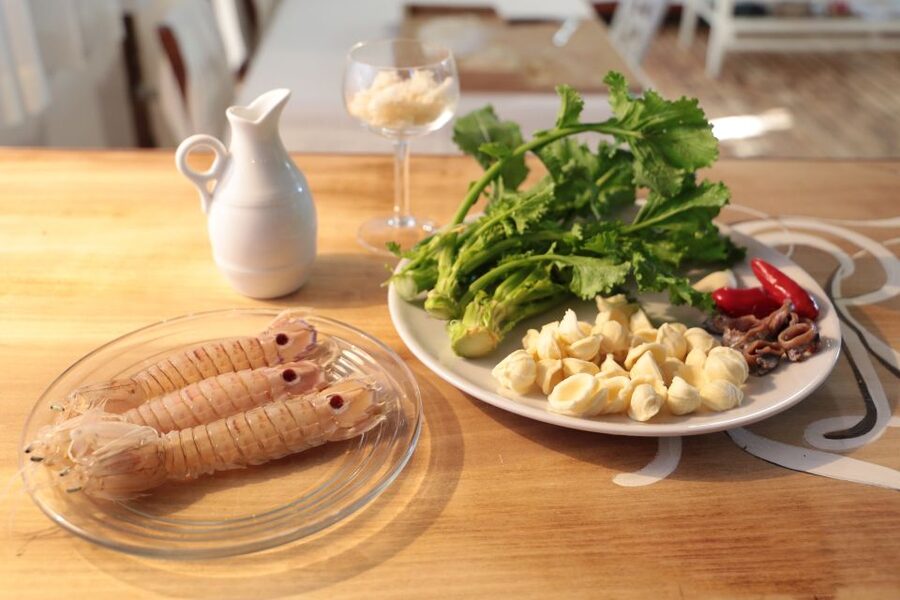 Ostuni: Cooking Class at a Local's Home - Sitting down to eat what you made