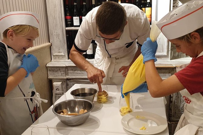 Pasta and Tiramisu Cooking Class Near the Colosseum - Rolling fettuccine from scratch