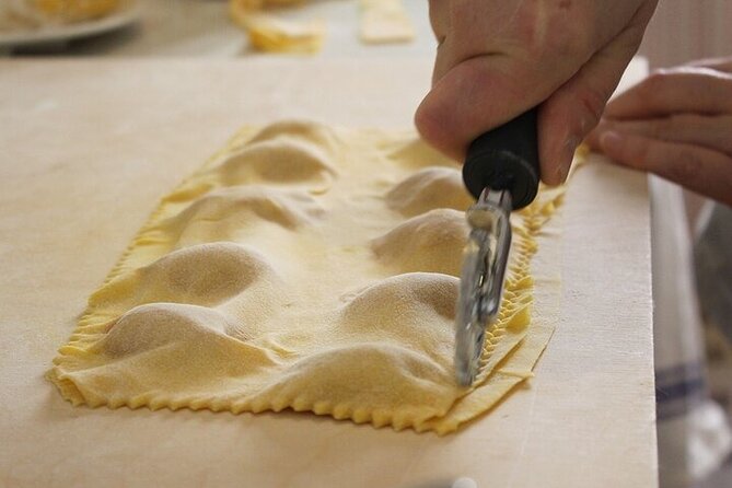 Pasta & Tiramisu Cooking Class + Italian Market Tour in Florence - Appetizers, wine, and the meal you prepare