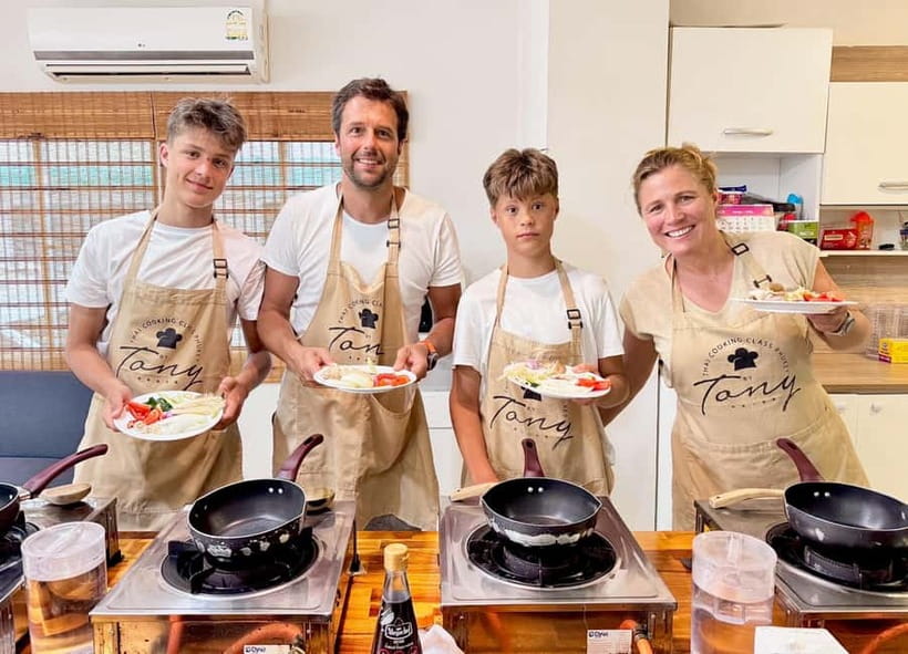 Phuket: Thai Cooking Class with 4 Dishes and Market Visit - Returning to the open kitchen
