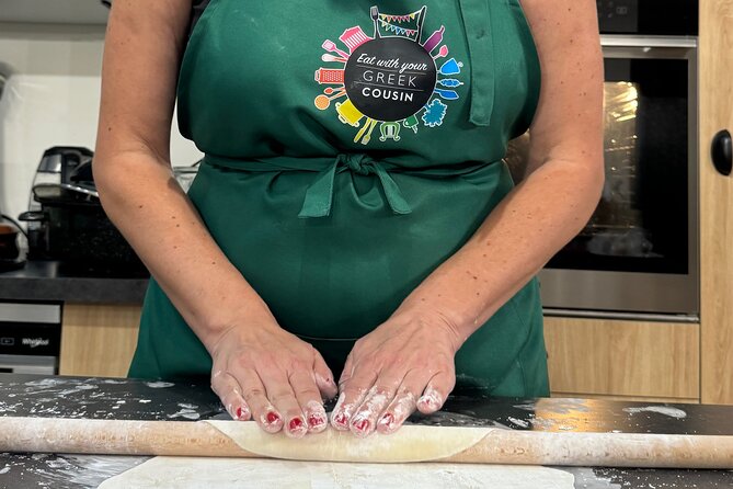 Pick Your Plates, Cook & Savor- Greek Cooking Class in Athens - Mixing dips from simple Greek ingredients