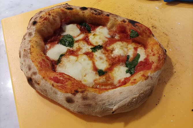 Pizza Cooking Class with Tiramisù and Wine Tasting in Milan - Making pizza near Milan’s Duomo