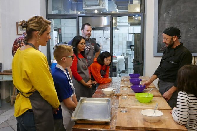 Pizza & Gelato Making Class in Oltrarno with Eating Europe - Rolling dough with a Florentine chef