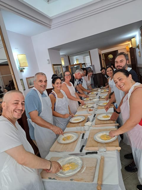 Pizza Pro, a Hands-On Cooking Class Near Castel Sant Angelo - Choosing toppings and baking the pizza