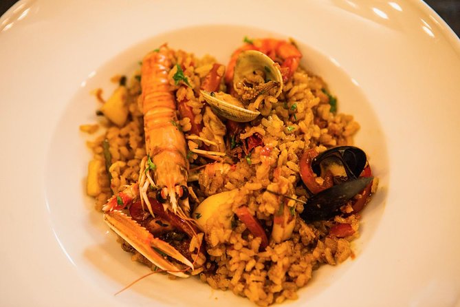 Private Barcelona Market Tour & Paella Cooking Class with Josh - Making paella from scratch