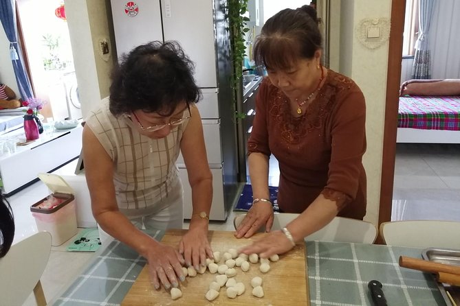 Private Home Cooking Class:Dumpling Cooking Class Tour in Xi'an - Preparing the dough from flour and water