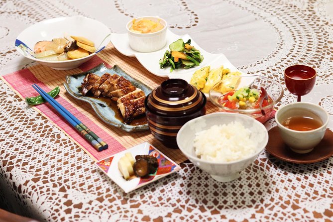 Private Home-Style Cooking Class in Osaka with Local Mom Yoshiko - Sitting down to eat the meal you made