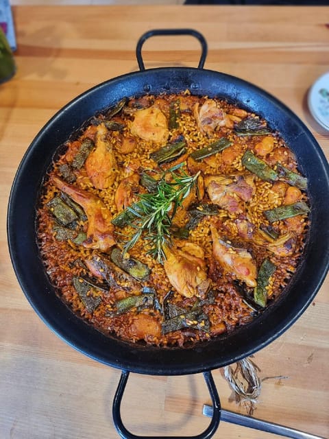 Private Paella & Tapas Cooking Class in a Local Chef's Home - A welcome drink sets the tone