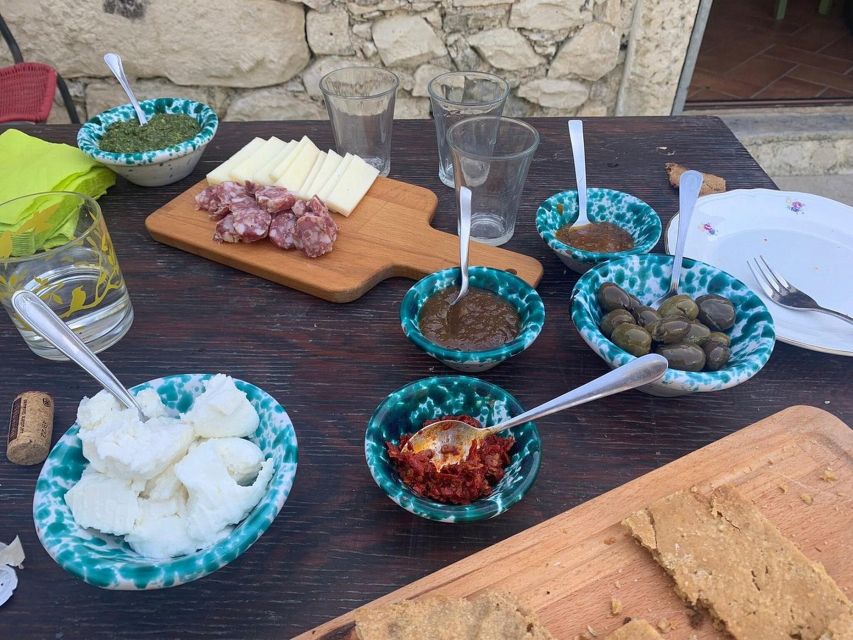 Ragusa Countryside Home Cooking Class & Meal - Lunch under an olive tree, or beside the stove