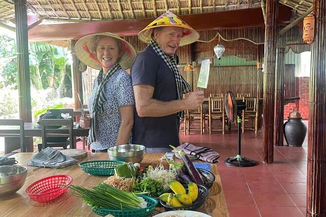 RICE PAPER Noodle Making Experience & Hoi An Cooking Class Class - Making rice paper noodles with a local villager