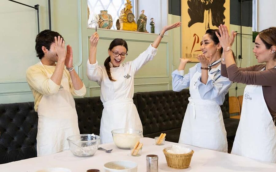 Rome: 3-in-1 Fettuccine, Ravioli, and Tiramisu Cooking Class - Sitting down to eat your own work