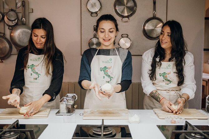 Rome Cooking Class: Make Pasta, Dine & Drink Wine With Local Chef - Rolling fettuccine and shaping ravioli