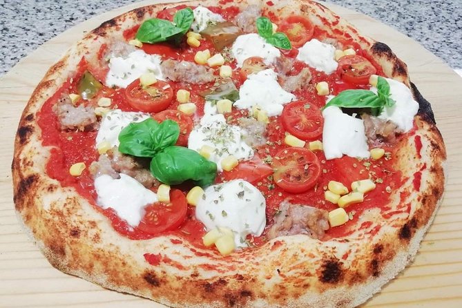Rome Cooking Class: Make Pizza and Pasta with Wine & Dessert - How much value does the $66.51 price offer?