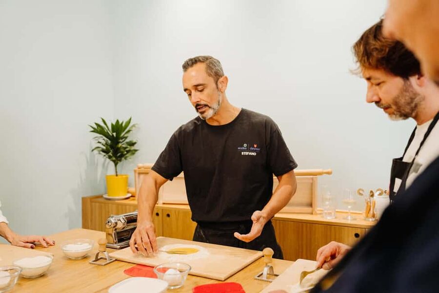 Rome: Fresh Pasta-Making Class with Wine and Gelato - Sitting down to eat your own work
