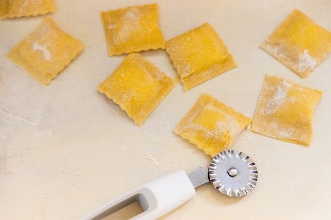 Rome: Hands-on Fettuccine, Ravioli & Tiramisu Cooking Class - Kneading dough and shaping fettuccine