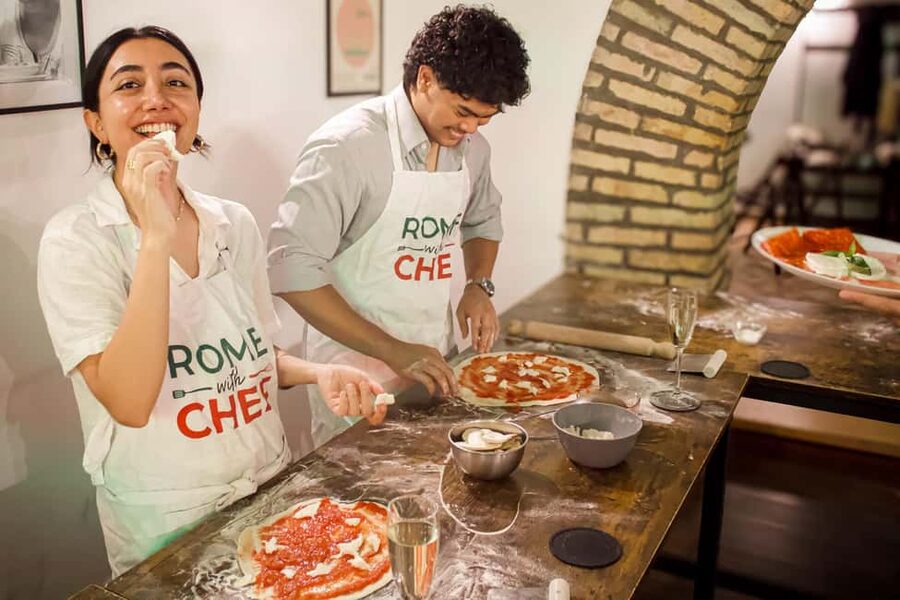 Rome: Hands-On Pizza Cooking Class with Spritz Mixology - Kneading dough and building your pizza