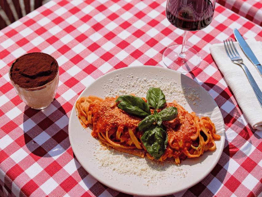 Rome: Pasta and Tiramisu Cooking Class in Piazza Navona - Assembling tiramisu with simple ingredients