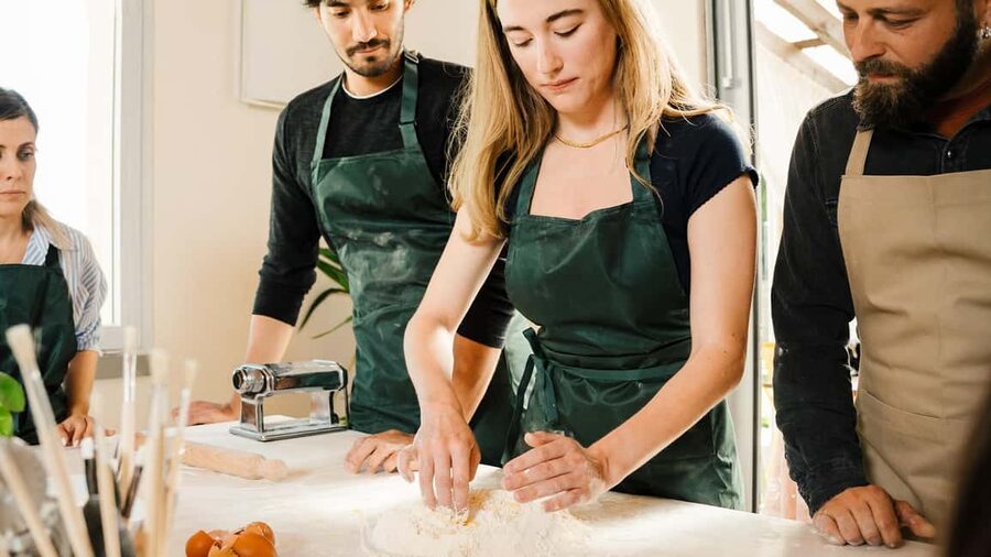 Rome: Pasta and Tiramisu Cooking Class with Prosecco - Sitting down to eat your own pasta