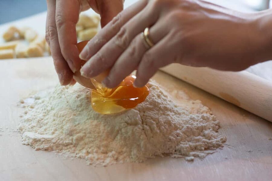 Rome: Pasta, Ravioli, and Tiramisu Cooking Class with Wine - Rolling fettuccine with your own hands