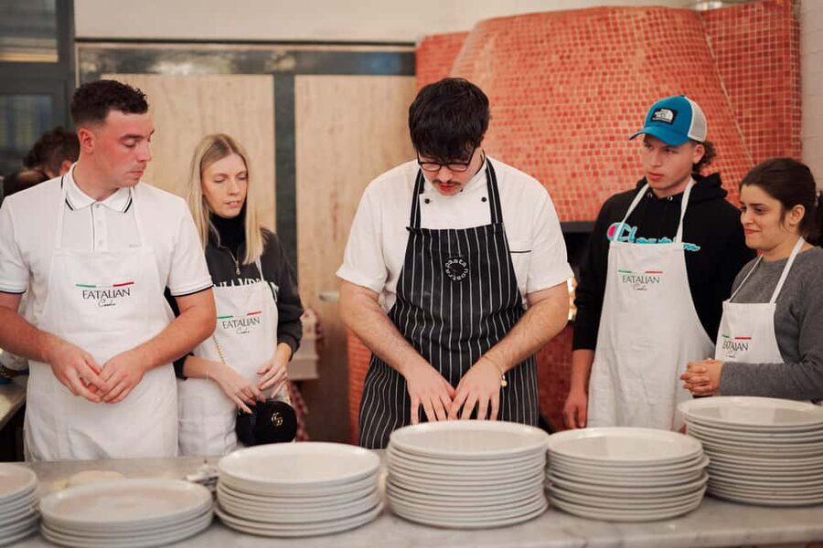 Rome: Pizza and Tiramisu Cooking Class in Piazza Navona - Making pizza beside Piazza Navona