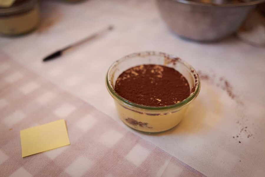 Rome: Pizza and Tiramisu Cooking Class in Piazza Navona - Sitting down to eat your own work