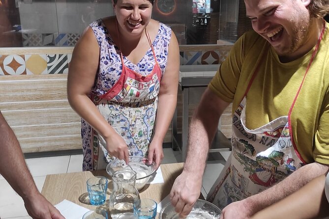 Semi-Private Pizza Making Experience in Naples with Drink - Eating your pizza with a drink