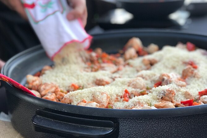 Sevilla: Rooftop Paella Cooking Class & 30-minute expert Q&A - Paella with Seville at Your Feet