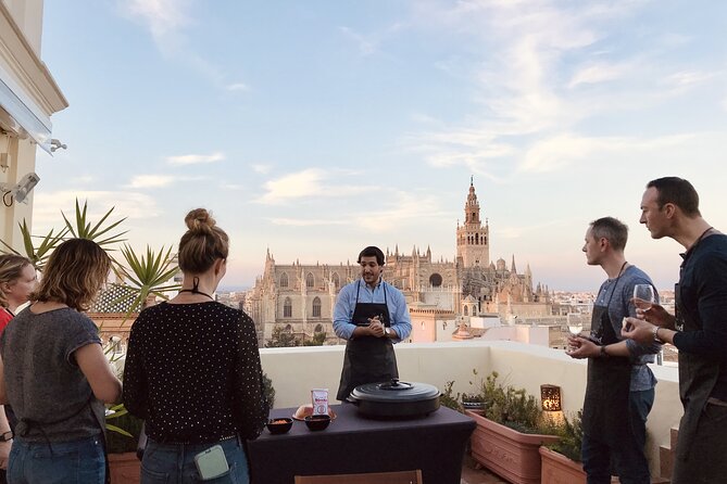 Sevilla: Rooftop Paella Cooking Class & 30-minute expert Q&A - Meeting Fernando Near the Roman Columns