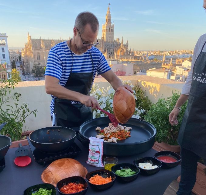 Seville: Paella Cooking Class & 30-Min Local Expert Q&A - Cooking chicken and vegetable paella step by step