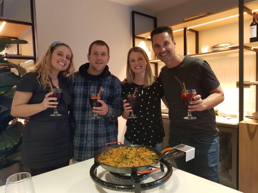 Seville: Paella-Cooking Experience with Sangria & Full Meal - Paella takes center stage in Seville